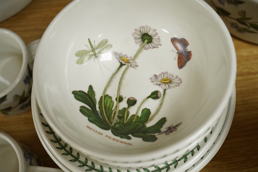 A quantity of Portmeirion tableware to include oval dishes, cups, saucers and dinner plates. Condition - mostly fair, some cracks